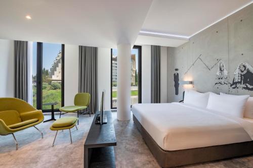 Imagen de la habitación del Hotel Golden Tulip Design Tbilisi. Foto 19