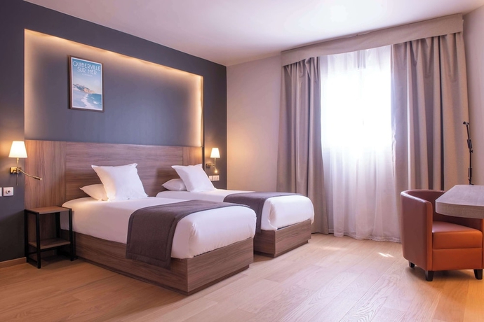 Imagen de la habitación del Hotel Golden Tulip Dieppe. Foto 11