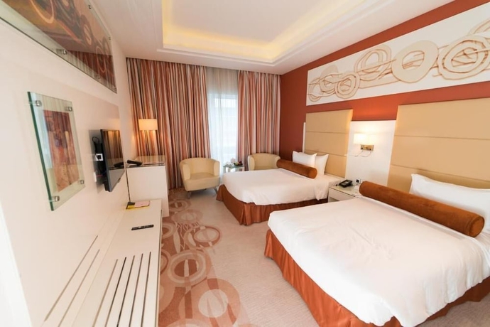 Imagen de la habitación del Hotel Golden Tulip Downtown Abu Dhabi. Foto 2