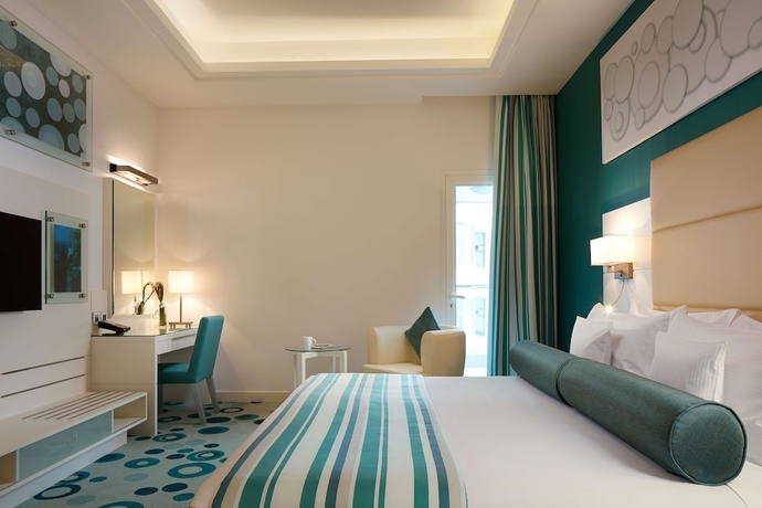 Imagen de la habitación del Hotel Golden Tulip Downtown Abu Dhabi. Foto 5