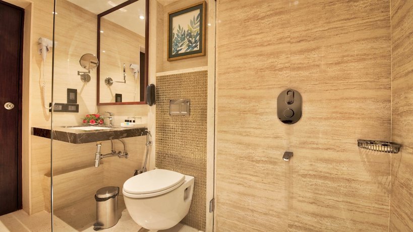 Imagen de la habitación del Hotel Golden Tulip Essential Jaipur. Foto 10