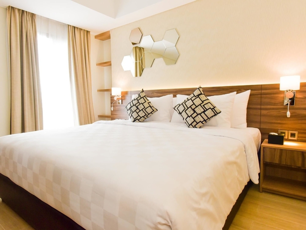 Imagen de la habitación del Hotel Golden Tulip Essential Tangerang. Foto 8