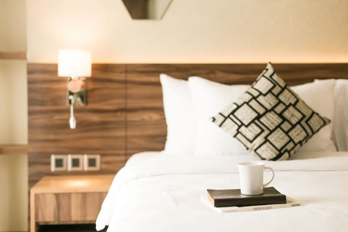 Imagen de la habitación del Hotel Golden Tulip Essential Tangerang. Foto 9