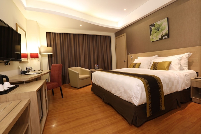 Imagen de la habitación del Hotel Golden Tulip Galaxy. Foto 4