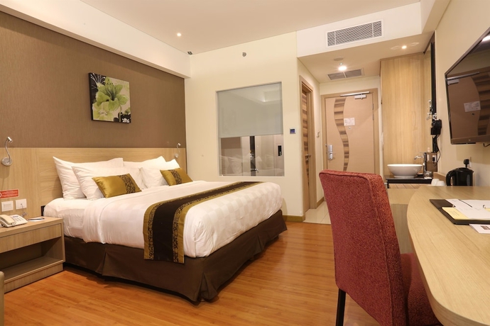 Imagen de la habitación del Hotel Golden Tulip Galaxy. Foto 5