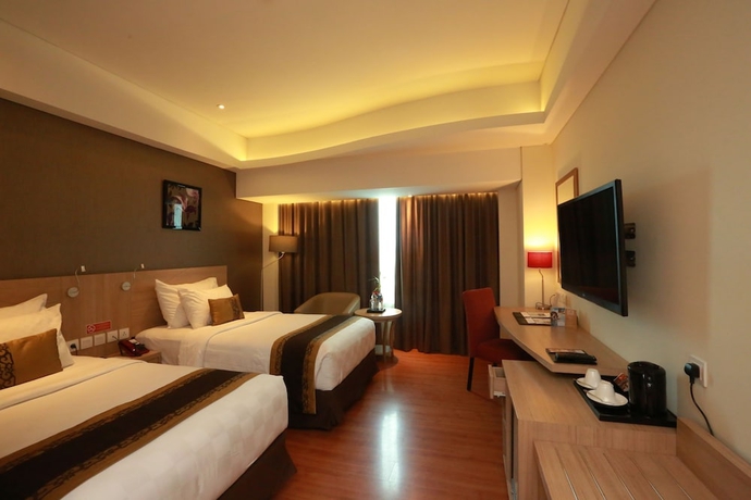 Imagen de la habitación del Hotel Golden Tulip Galaxy. Foto 10