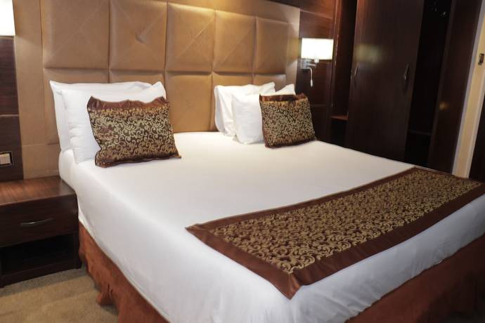 Imagen de la habitación del Hotel Golden Tulip Garden City - Rivotel. Foto 3