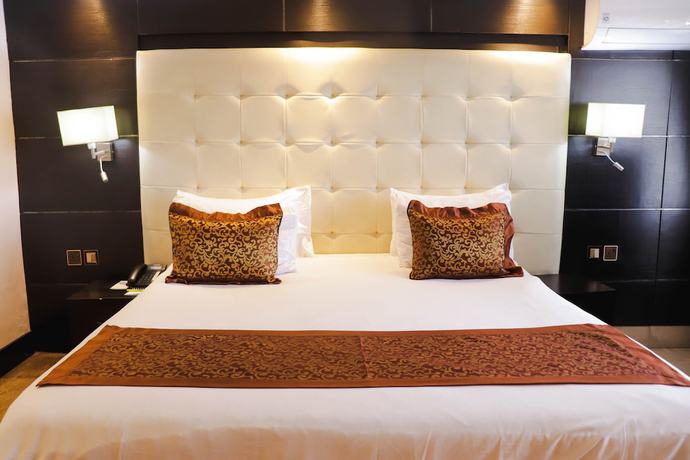 Imagen de la habitación del Hotel Golden Tulip Garden City - Rivotel. Foto 5