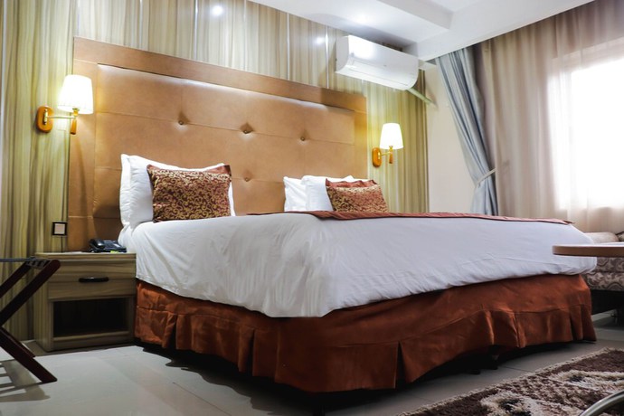 Imagen de la habitación del Hotel Golden Tulip Garden City - Rivotel. Foto 12