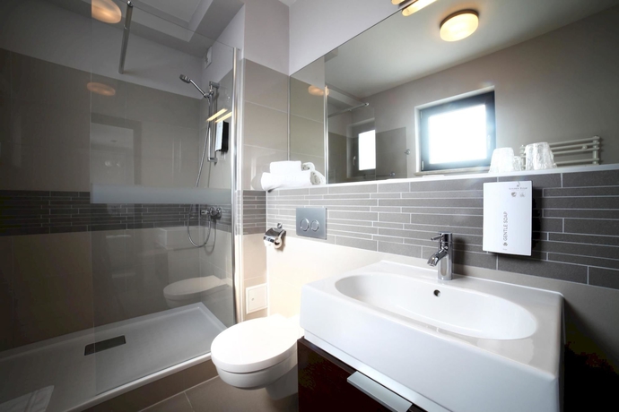 Imagen de la habitación del Hotel Golden Tulip Gdańsk Residence. Foto 1