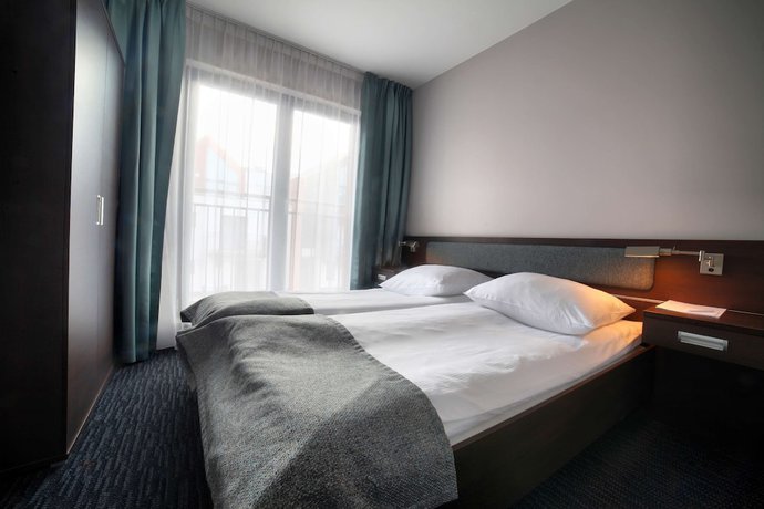 Imagen de la habitación del Hotel Golden Tulip Gdańsk Residence. Foto 5