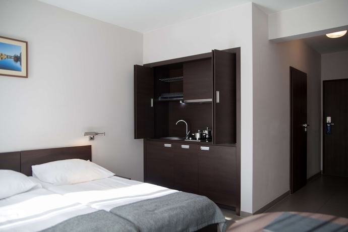 Imagen de la habitación del Hotel Golden Tulip Gdańsk Residence. Foto 11