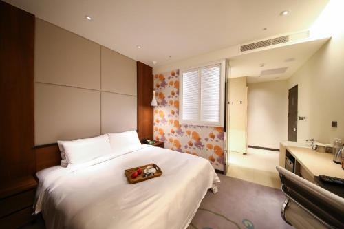 Imagen de la habitación del Hotel Golden Tulip Glory Fine. Foto 4
