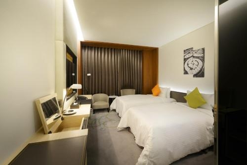 Imagen de la habitación del Hotel Golden Tulip Glory Fine. Foto 8