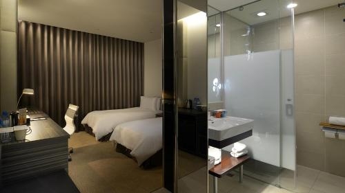 Imagen de la habitación del Hotel Golden Tulip Glory Fine. Foto 9