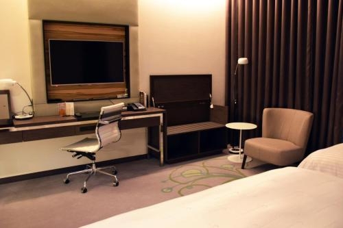 Imagen de la habitación del Hotel Golden Tulip Glory Fine. Foto 10
