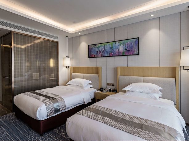 Imagen de la habitación del Hotel Golden Tulip Guiyang. Foto 14