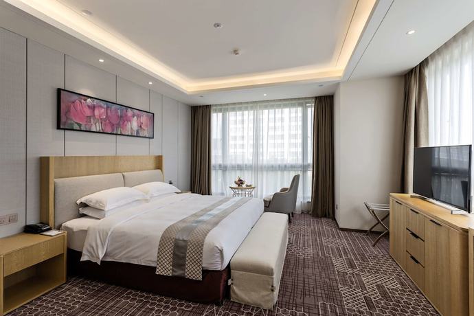 Imagen de la habitación del Hotel Golden Tulip Guiyang. Foto 16
