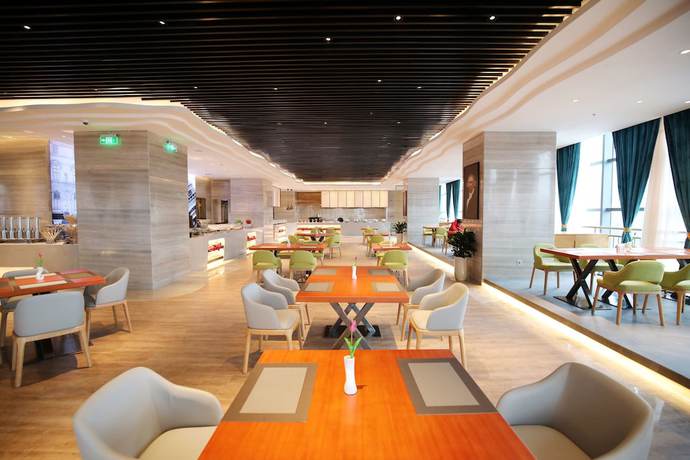 Imagen del bar/restaurante del Hotel Golden Tulip Guiyang. Foto 11