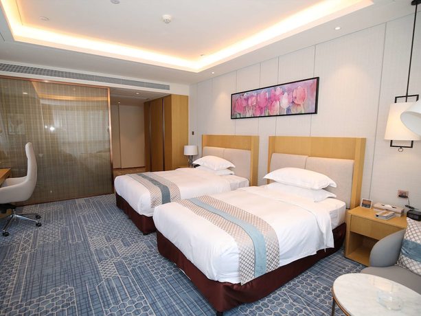 Imagen de la habitación del Hotel Golden Tulip Guiyang. Foto 17