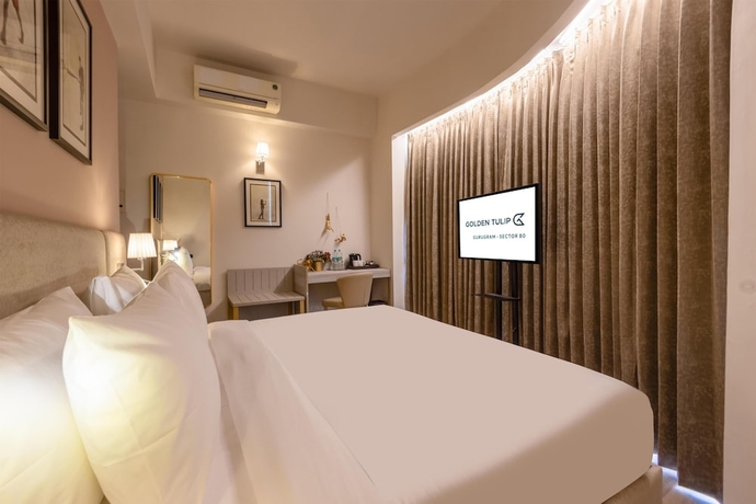 Imagen de la habitación del Hotel Golden Tulip Gurugram. Foto 4