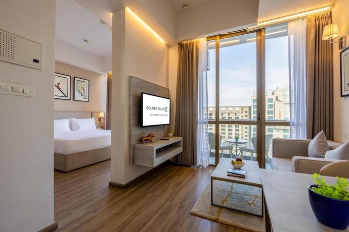 Imagen de la habitación del Hotel Golden Tulip Gurugram. Foto 6