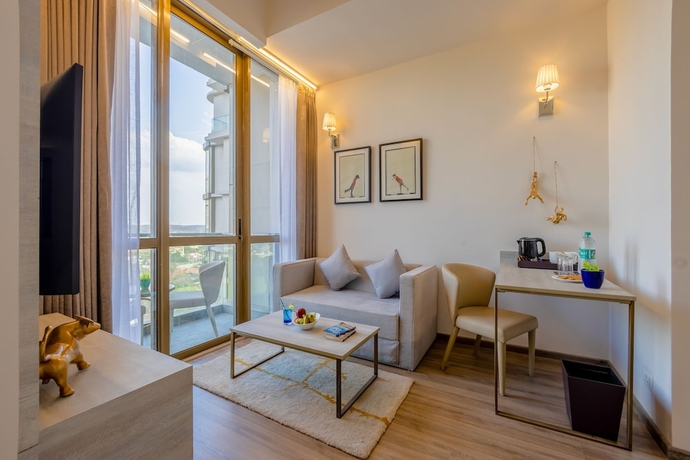 Imagen de la habitación del Hotel Golden Tulip Gurugram. Foto 7