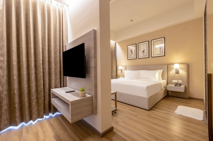 Imagen de la habitación del Hotel Golden Tulip Gurugram. Foto 9