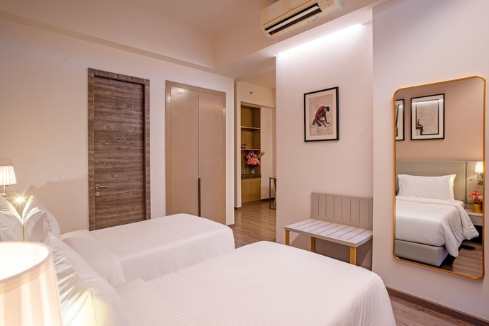 Imagen de la habitación del Hotel Golden Tulip Gurugram. Foto 10
