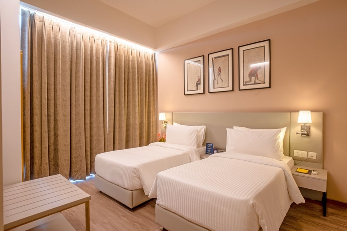 Imagen de la habitación del Hotel Golden Tulip Gurugram. Foto 11