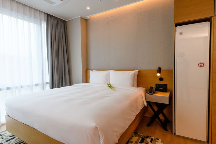 Imagen de la habitación del Hotel Golden Tulip Haeundae Hotel and Suites. Foto 11