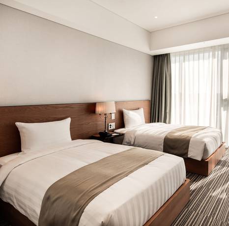 Imagen de la habitación del Hotel Golden Tulip Incheon Airport Hotel and Suites. Foto 11