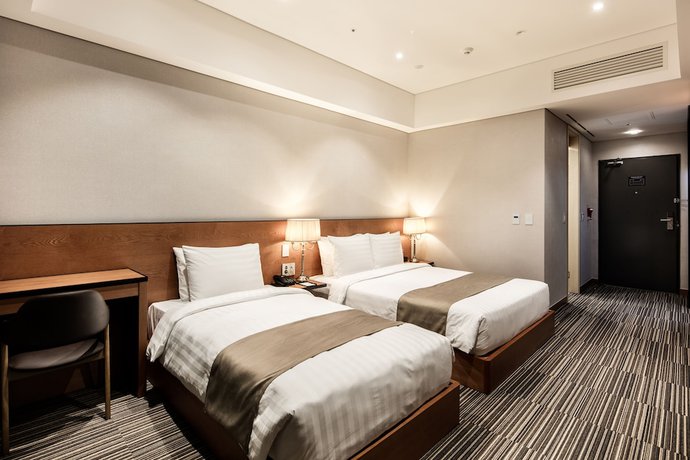 Imagen de la habitación del Hotel Golden Tulip Incheon Airport Hotel and Suites. Foto 14