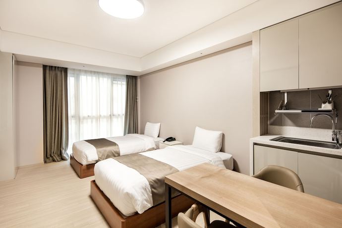 Imagen de la habitación del Hotel Golden Tulip Incheon Airport Hotel and Suites. Foto 19