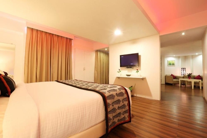 Imagen de la habitación del Hotel Golden Tulip Jaipur. Foto 8