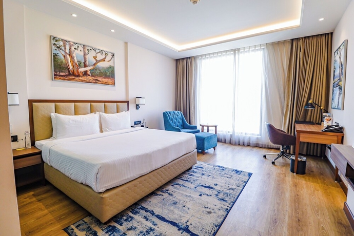 Imagen de la habitación del Hotel Golden Tulip Jalandhar. Foto 10