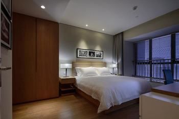 Imagen de la habitación del Hotel Golden Tulip K-land Suzhou Residence. Foto 6