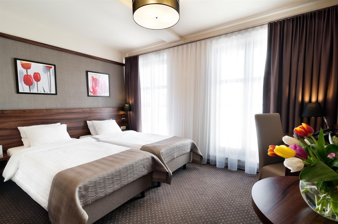 Imagen de la habitación del Hotel Golden Tulip Krakow City Center. Foto 11