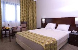 Imagen de la habitación del Hotel Golden Tulip Kumasi City. Foto 4