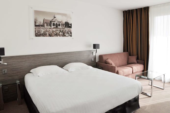 Imagen de la habitación del Hotel Golden Tulip La Baule. Foto 10