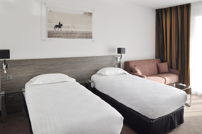 Imagen de la habitación del Hotel Golden Tulip La Baule. Foto 11