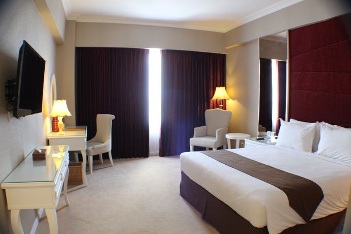 Imagen de la habitación del Hotel Golden Tulip Legacy Surabaya. Foto 4