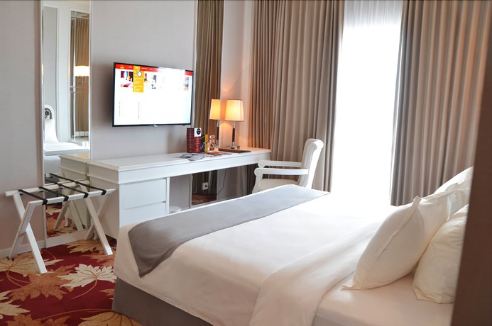 Imagen de la habitación del Hotel Golden Tulip Legacy Surabaya. Foto 8