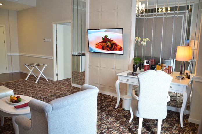 Imagen de la habitación del Hotel Golden Tulip Legacy Surabaya. Foto 9