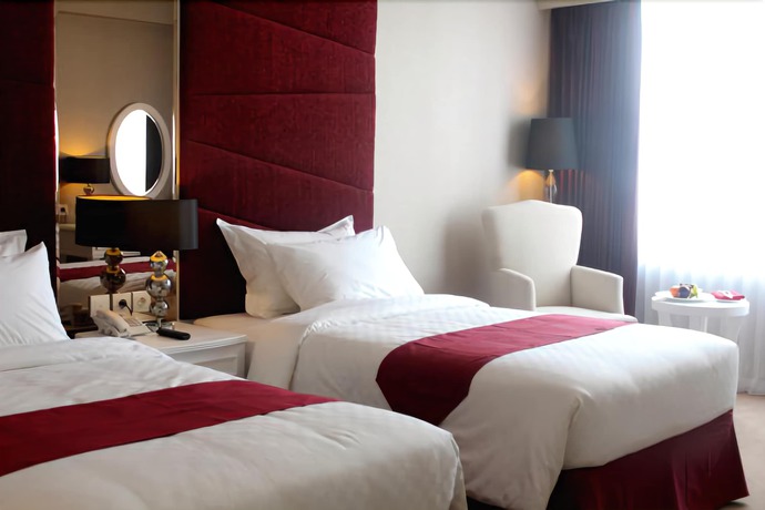 Imagen de la habitación del Hotel Golden Tulip Legacy Surabaya. Foto 11