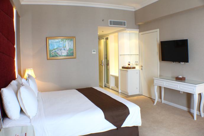 Imagen de la habitación del Hotel Golden Tulip Legacy Surabaya. Foto 13