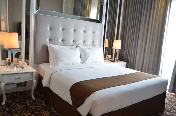 Imagen de la habitación del Hotel Golden Tulip Legacy Surabaya. Foto 15