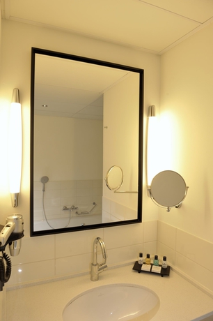 Imagen de la habitación del Hotel Golden Tulip Leiden Centre. Foto 15