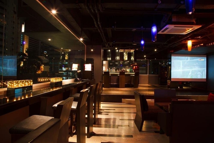 Imagen del bar/restaurante del Hotel Golden Tulip Mandison Suites. Foto 5