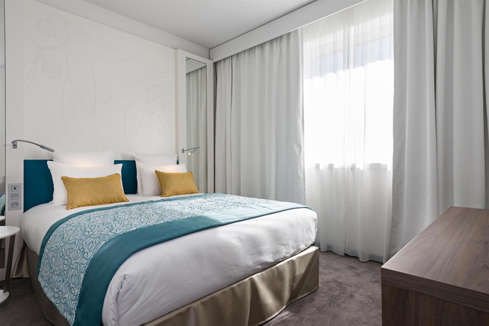 Imagen de la habitación del Hotel Golden Tulip Marseille Euromed. Foto 5